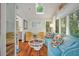 Bright living room with skylight, hardwood floors, and comfortable, modern furniture at 597 Oyster Rake Dr, Kiawah Island, SC 29455