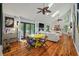 Sun-filled living area with hardwood floors, vaulted ceilings, and seamless indoor-outdoor flow at 597 Oyster Rake Dr, Kiawah Island, SC 29455