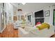 Bright living room with high ceilings, skylights, hardwood floors and fireplace at 597 Oyster Rake Dr, Kiawah Island, SC 29455