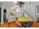 Open living space featuring hardwood floors, fireplace, and a bright eat in kitchen at 597 Oyster Rake Dr, Kiawah Island, SC 29455
