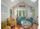 Cozy living room with a comfortable seating arrangement and skylights at 597 Oyster Rake Dr, Kiawah Island, SC 29455