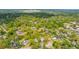 An aerial view of a neighborhood with mature trees providing shade over homes at 617 Hampton St, Walterboro, SC 29488