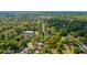 Sprawling aerial view of a charming town with tree-lined streets and the subject property at 617 Hampton St, Walterboro, SC 29488