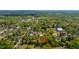 An aerial view showcases the neighborhood, lined with mature trees and traditional-style homes in a serene setting at 617 Hampton St, Walterboro, SC 29488
