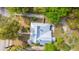 Bird's-eye view showcases a home's metal roof, patio furniture, and landscaping in a residential neighborhood at 617 Hampton St, Walterboro, SC 29488