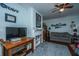Charming bedroom with light blue walls, decorative fireplace, and wood-paneled ceiling, creating a cozy atmosphere at 617 Hampton St, Walterboro, SC 29488