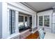 Cozy dining room featuring built-in shelving, a window seat, and a hardwood floor at 617 Hampton St, Walterboro, SC 29488