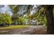 Charming single-Gathering home featuring mature trees and a large front yard at 617 Hampton St, Walterboro, SC 29488