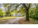 Charming single-Gathering home featuring mature trees and a large front yard at 617 Hampton St, Walterboro, SC 29488