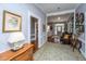 Foyer featuring hardwood floors, neutral-toned walls, and an area rug at 617 Hampton St, Walterboro, SC 29488