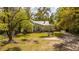 Exterior view with porch and lovely landscaping at 617 Hampton St, Walterboro, SC 29488