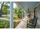 Inviting porch with rocking chairs, and an outdoor lantern at 617 Hampton St, Walterboro, SC 29488