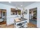 Open kitchen featuring white cabinets, an island, and stainless steel appliances at 617 Hampton St, Walterboro, SC 29488