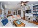 Inviting living room with built-in bookshelves, a cozy fireplace, and hardwood floors at 617 Hampton St, Walterboro, SC 29488