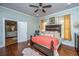 Serene bedroom with hardwood floors and a view into the adjoining sitting room at 617 Hampton St, Walterboro, SC 29488