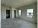 Spacious bedroom with natural light from two windows and a convenient walk-in closet at 721 Blueway Ave, Summerville, SC 29486