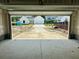 Spacious garage offering ample parking and storage, with a clear view of the neighborhood at 721 Blueway Ave, Summerville, SC 29486