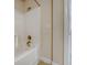 Bathroom featuring a shower and tub with white tile surround at 9028 Parlor Dr, Ladson, SC 29456