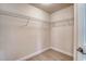 A well-organized closet features sturdy wire shelving for optimal storage and a neutral carpet at 9028 Parlor Dr, Ladson, SC 29456