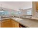 Kitchen featuring a tile backsplash, quartz countertop, and stainless steel faucet at 9028 Parlor Dr, Ladson, SC 29456