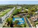 Aerial view of community sports courts, trees, buildings and Arthur Ravenel Bridge, Jr. in the distance at 956 Provincial Cir, Mount Pleasant, SC 29464