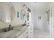 Elegant bathroom with marble countertops, double sinks, and a glass-enclosed shower with white subway tiles at 956 Provincial Cir, Mount Pleasant, SC 29464