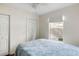 Bright bedroom with plush carpeting, a double door closet, and a large window letting in natural light at 956 Provincial Cir, Mount Pleasant, SC 29464