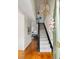 Bright foyer featuring hardwood floors, staircase, and stylish chandelier at 956 Provincial Cir, Mount Pleasant, SC 29464