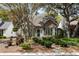 Charming brick home with green shutters and a well-manicured front yard at 956 Provincial Cir, Mount Pleasant, SC 29464