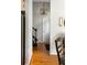 Hallway with hardwood floors leading to the stairs and other rooms at 956 Provincial Cir, Mount Pleasant, SC 29464