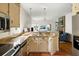 Spacious kitchen with light cabinets, granite countertops, and open to the living area at 956 Provincial Cir, Mount Pleasant, SC 29464