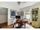 Inviting home office with wooden desk, decorated with sports and memorabilia creating a personalized workspace at 956 Provincial Cir, Mount Pleasant, SC 29464