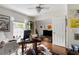 Inviting home office with hardwood floors, decorated with sports and memorabilia creating a personalized workspace at 956 Provincial Cir, Mount Pleasant, SC 29464