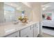 Bathroom with dual sinks, quartz countertops, with shower and view to primary bedroom at Tbd O'Leary Circle, Summerville, SC 29483
