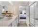 Bathroom with dual sinks, quartz countertops, and a view to the primary bedroom at Tbd O'Leary Circle, Summerville, SC 29483