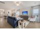 Open concept living room flowing into the kitchen with modern furnishings and natural light at Tbd O'Leary Circle, Summerville, SC 29483