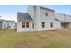 New construction home with a cozy backyard and a view of other homes in the neighborhood at 1014 Marsh Harrier Dr # Cc3-1-5, Ravenel, SC 29470