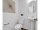 Powder room featuring a pedestal sink, modern fixtures, and elegant decor at 1014 Marsh Harrier Dr # Cc3-1-5, Ravenel, SC 29470