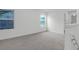 Spacious loft area with two windows and carpet at 1014 Marsh Harrier Dr # Cc3-1-5, Ravenel, SC 29470