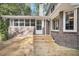 Inviting back deck area with stylish brick and natural wood, perfect for outdoor gatherings at 109 Dan Miler Ln, Summerville, SC 29483