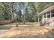 Wide backyard with newly constructed wooden deck and patio furniture at 109 Dan Miler Ln, Summerville, SC 29483