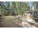 Expansive backyard featuring a patio with an outdoor dining set, ideal for entertaining at 109 Dan Miler Ln, Summerville, SC 29483