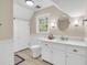 Bathroom features a modern vanity, stylish mirror and a window with backyard view at 109 Dan Miler Ln, Summerville, SC 29483