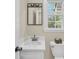 Bathroom with brushed nickel finishes, a large mirror and lots of natural light at 109 Dan Miler Ln, Summerville, SC 29483