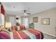 Cozy bedroom featuring two twin beds, ceiling fan, and natural lighting at 109 Dan Miler Ln, Summerville, SC 29483