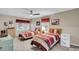 Cozy bedroom featuring two twin beds, ceiling fan, and natural lighting at 109 Dan Miler Ln, Summerville, SC 29483