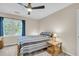 Comfortable bedroom featuring a wooden bed frame, side table, and natural lighting at 109 Dan Miler Ln, Summerville, SC 29483
