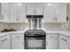 Modern kitchen with white cabinets, stainless steel appliances, and granite countertops at 109 Dan Miler Ln, Summerville, SC 29483