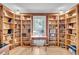 Charming office space with custom built-in bookshelves providing ample storage and display area at 109 Dan Miler Ln, Summerville, SC 29483