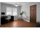Bright office features hardwood floors, a ceiling fan, and an abundance of natural light at 1113 Smithfield Pl, Hanahan, SC 29410